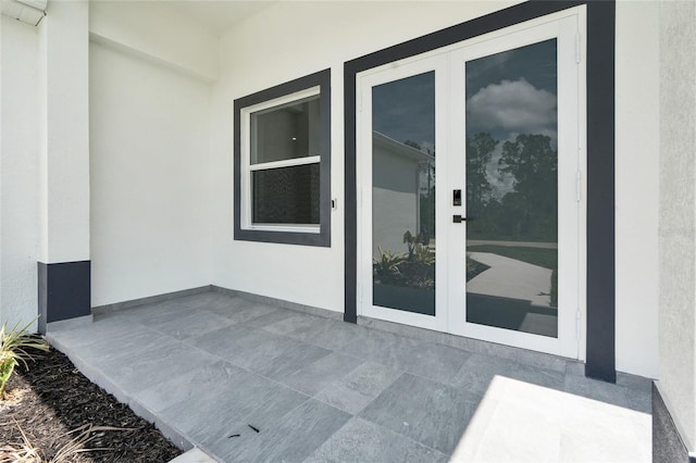 3202 41st St W, Lehigh Acres, FL 33971 - view of patio featuring french doors