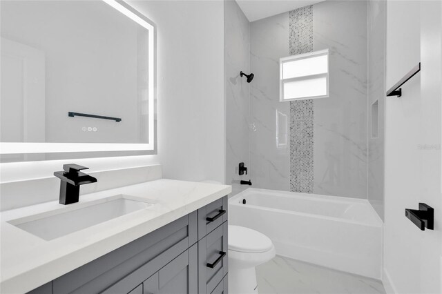 3202 41st St W, Lehigh Acres, FL 33971 - bathroom with vanity, marble finish floors, and  shower combination