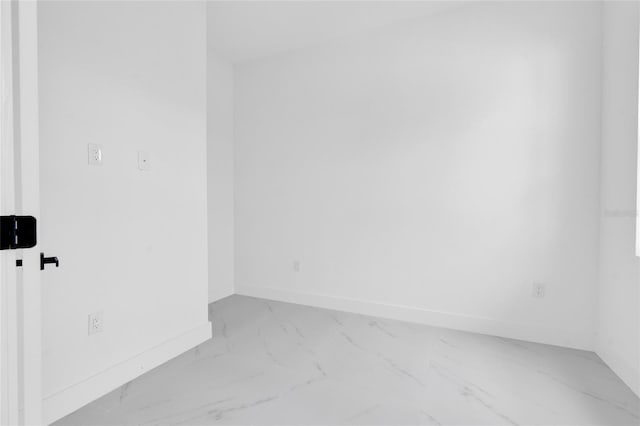 3202 41st St W, Lehigh Acres, FL 33971 - spare room featuring marble finish floors and baseboards