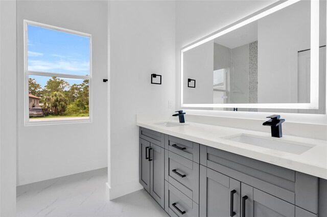 3202 41st St W, Lehigh Acres, FL 33971 - full bathroom with marble finish floors and double vanity