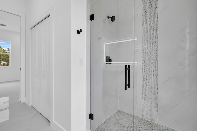 3202 41st St W, Lehigh Acres, FL 33971 - bathroom featuring a marble finish shower, a closet, and marble finish floors