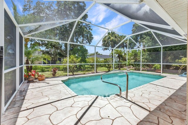 3305 Nansen Ln, North Port, FL 34286 - outdoor pool with a patio and a lanai
