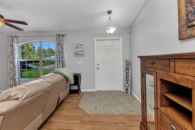 3305 Nansen Ln, North Port, FL 34286 - foyer entrance with a ceiling fan and light wood-style flooring