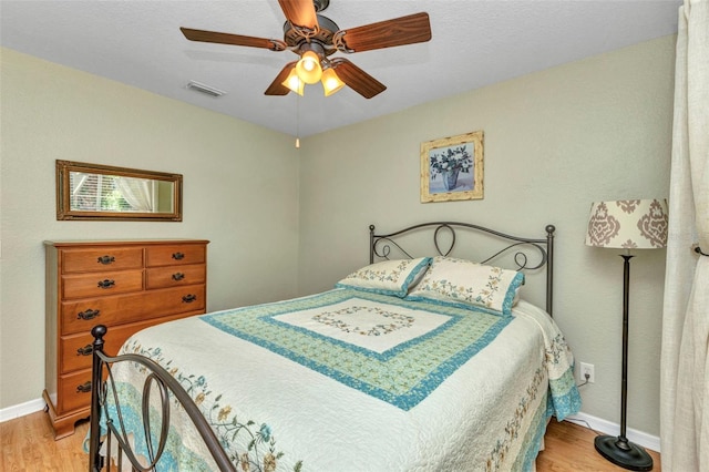 3305 Nansen Ln, North Port, FL 34286 - bedroom featuring light wood-style flooring and a ceiling fan