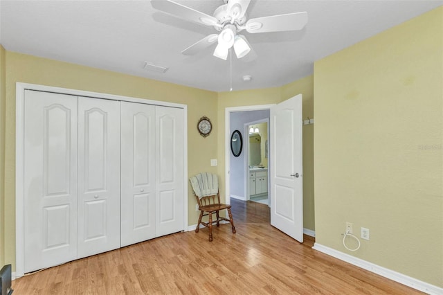3305 Nansen Ln, North Port, FL 34286 - bedroom with wood finished floors, a closet, and ceiling fan