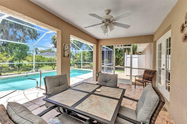 3305 Nansen Ln, North Port, FL 34286 - sunroom / solarium featuring french doors, a ceiling fan, and a pool