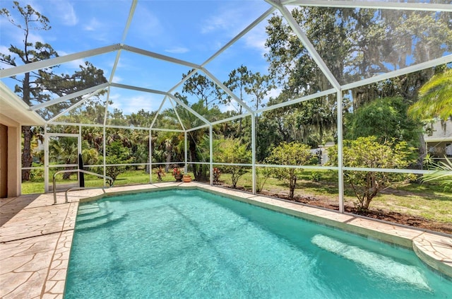 3305 Nansen Ln, North Port, FL 34286 - outdoor pool featuring glass enclosure and a patio area