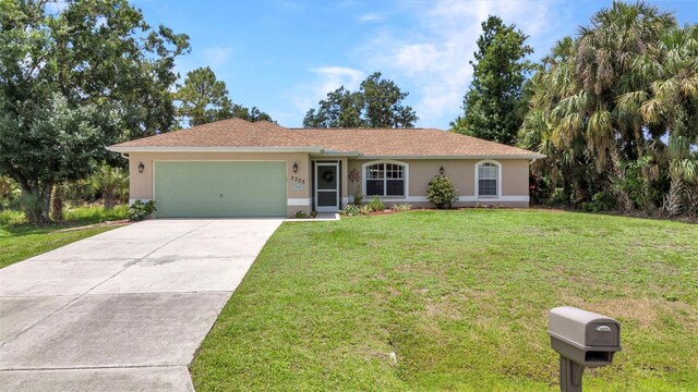 3305 Nansen Ln, North Port, FL 34286 - single story home featuring stucco siding, an attached garage, a front lawn, and concrete driveway