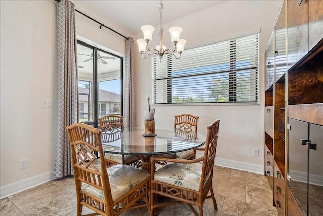 1275 Blue Lake Cir, Punta Gorda, FL 33983 - dining room featuring baseboards and a chandelier