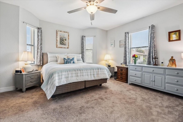 1275 Blue Lake Cir, Punta Gorda, FL 33983 - bedroom featuring multiple windows, light colored carpet, and ceiling fan