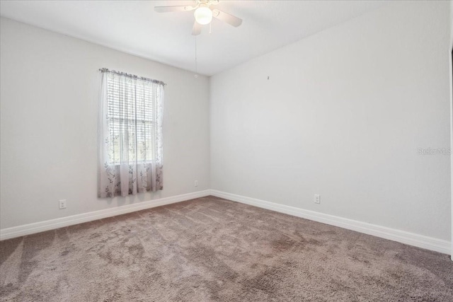 1275 Blue Lake Cir, Punta Gorda, FL 33983 - carpeted spare room with ceiling fan and baseboards