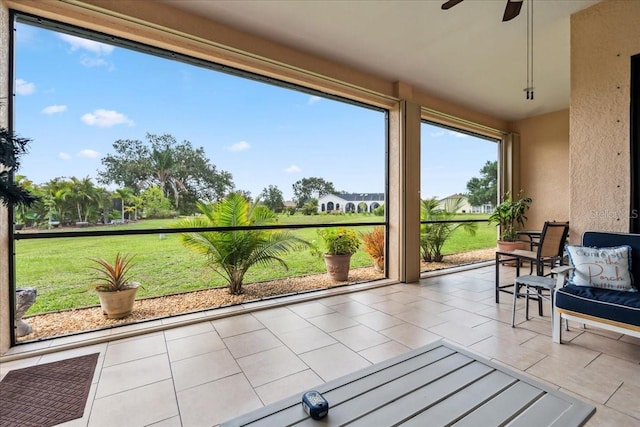 1275 Blue Lake Cir, Punta Gorda, FL 33983 - sunroom / solarium featuring tile patterned flooring