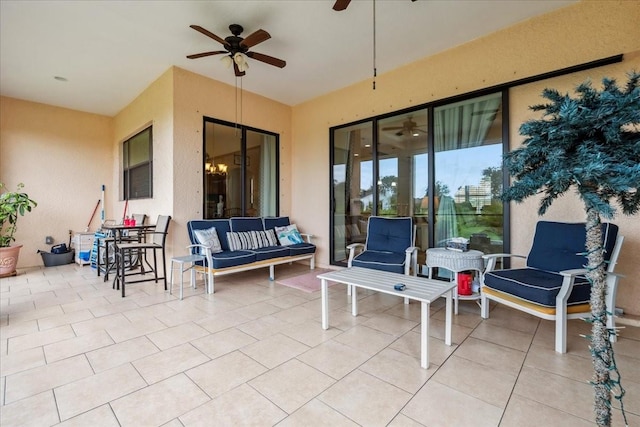 1275 Blue Lake Cir, Punta Gorda, FL 33983 - view of patio with a ceiling fan and outdoor lounge area
