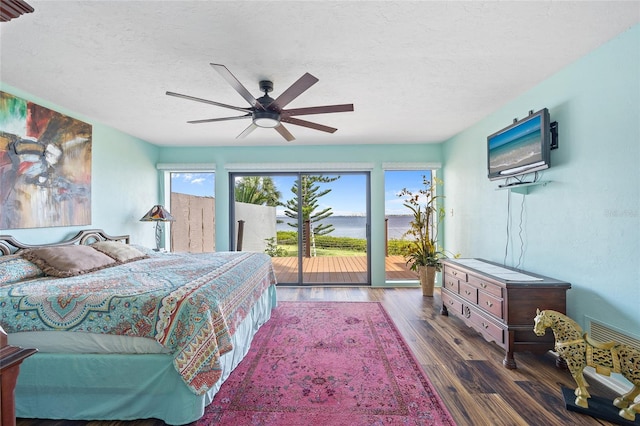 25188 Marion Ave Unit 45, Punta Gorda, FL 33950 - bedroom with access to outside, wood finished floors, a textured ceiling, and ceiling fan