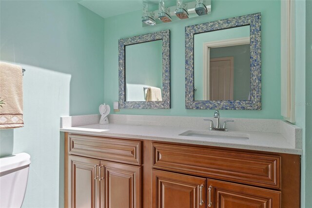 25188 Marion Ave Unit 45, Punta Gorda, FL 33950 - bathroom featuring vanity and toilet