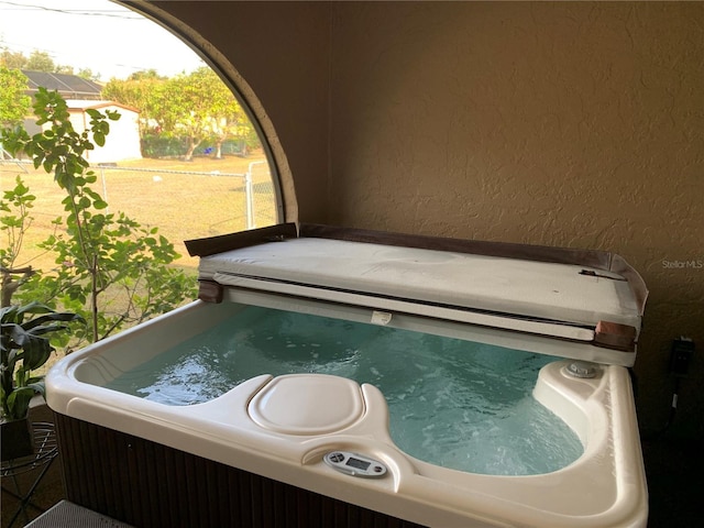 21460 Sheldon Ave, Port Charlotte, FL 33952 - exterior view of a hot tub and stucco siding