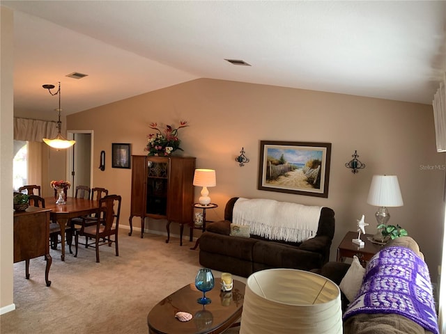 21460 Sheldon Ave, Port Charlotte, FL 33952 - living room with lofted ceiling and light carpet