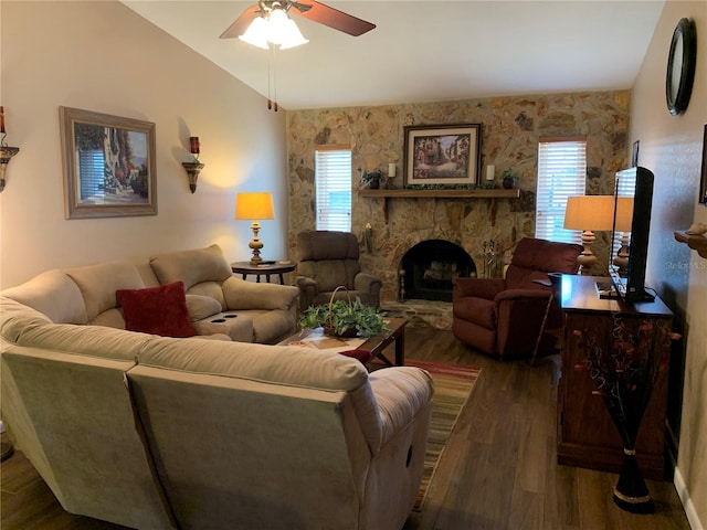 21460 Sheldon Ave, Port Charlotte, FL 33952 - living room with wood finished floors, a ceiling fan, lofted ceiling, and a fireplace