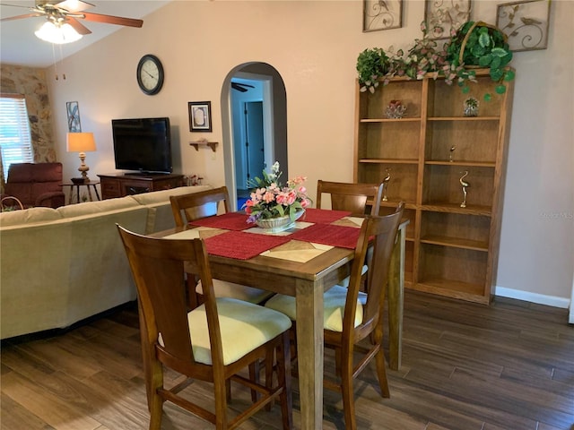 21460 Sheldon Ave, Port Charlotte, FL 33952 - dining area featuring ceiling fan, arched walkways, dark wood-style flooring, and lofted ceiling