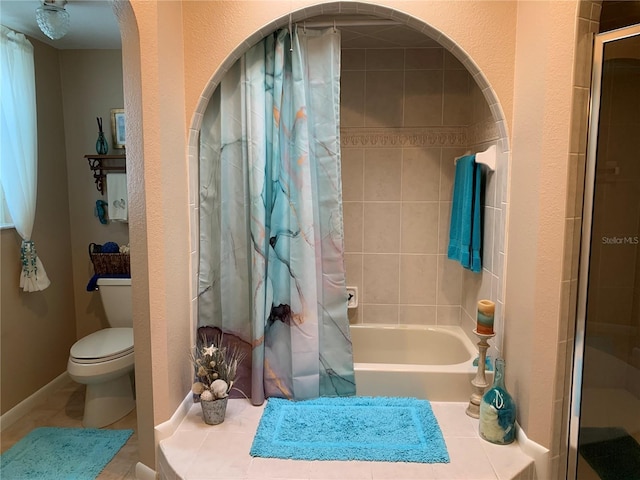 21460 Sheldon Ave, Port Charlotte, FL 33952 - bathroom featuring tile patterned floors and shower / bath combo with shower curtain