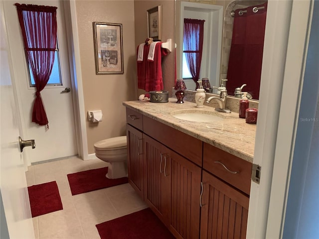 21460 Sheldon Ave, Port Charlotte, FL 33952 - bathroom featuring vanity, plenty of natural light, and tile patterned floors