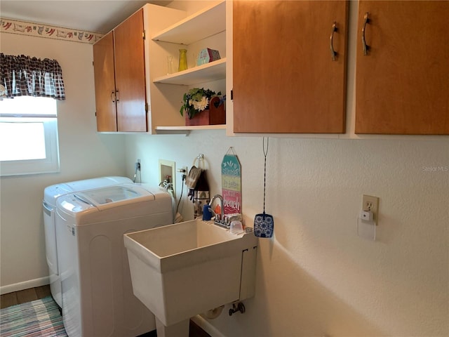 21460 Sheldon Ave, Port Charlotte, FL 33952 - laundry area featuring cabinet space and independent washer and dryer