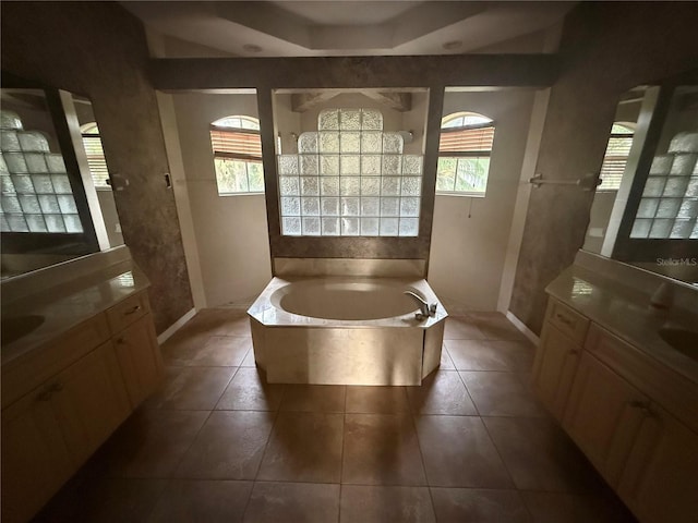 2143 Santonian Ter, North Port, FL 34286 - full bath with healthy amount of natural light, a bath, and tile patterned floors