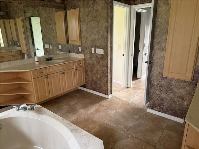2143 Santonian Ter, North Port, FL 34286 - bathroom with vanity, tile patterned floors, and a tub to relax in