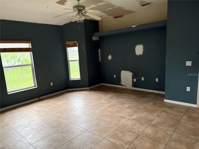 2143 Santonian Ter, North Port, FL 34286 - empty room with light tile patterned floors, a ceiling fan, and vaulted ceiling