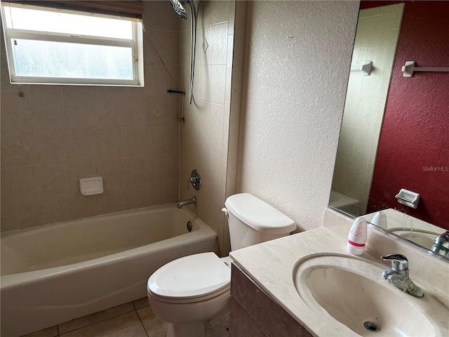 2143 Santonian Ter, North Port, FL 34286 - full bathroom featuring a textured wall, tile patterned floors, bathing tub / shower combination, and vanity
