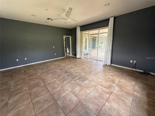 2143 Santonian Ter, North Port, FL 34286 - tiled spare room featuring ceiling fan and baseboards