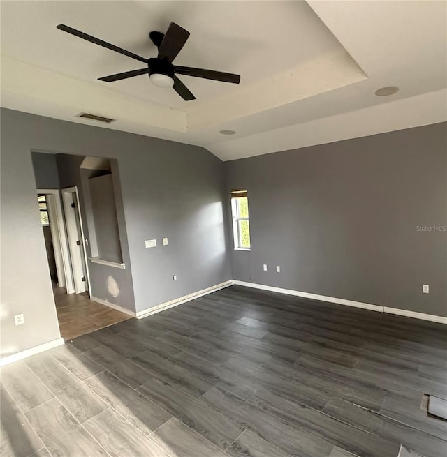 2143 Santonian Ter, North Port, FL 34286 - empty room with a ceiling fan, dark wood-style flooring, and lofted ceiling