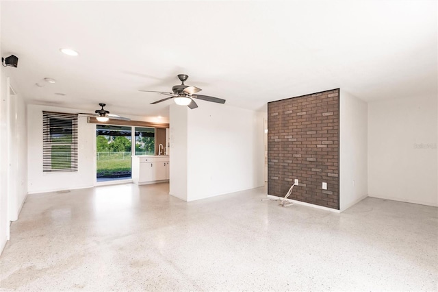 3497 Cohoes St, Port Charlotte, FL 33952 - unfurnished living room with dark aggregate flooring and ceiling fan