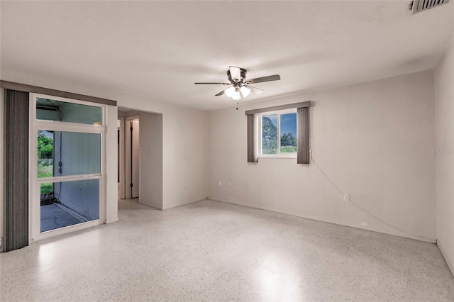 3497 Cohoes St, Port Charlotte, FL 33952 - empty room featuring speckle patterned floor and a ceiling fan