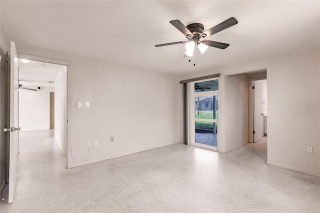 3497 Cohoes St, Port Charlotte, FL 33952 - spare room featuring ceiling fan and speckle patterned floor
