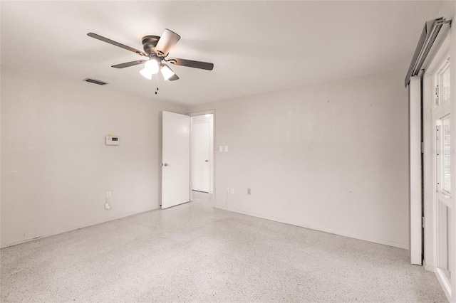 3497 Cohoes St, Port Charlotte, FL 33952 - unfurnished bedroom with speckled floor and ceiling fan