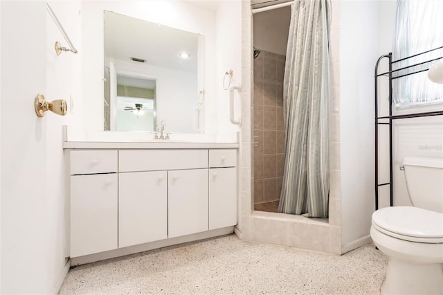3497 Cohoes St, Port Charlotte, FL 33952 - bathroom featuring vanity, a tile shower, and speckle patterned floor