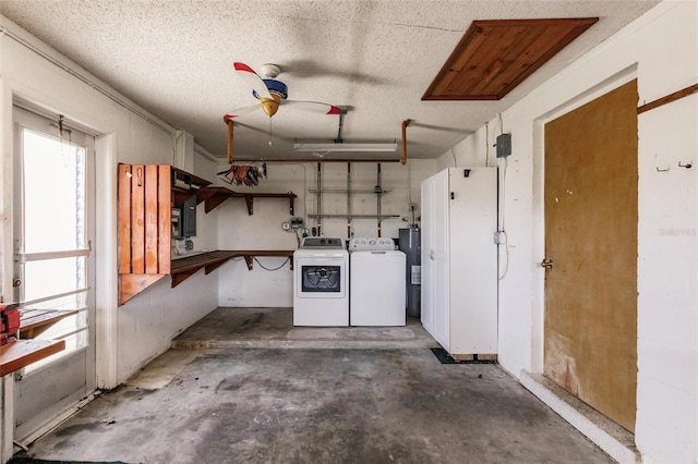 3497 Cohoes St, Port Charlotte, FL 33952 - garage with a ceiling fan, washer and clothes dryer, and water heater