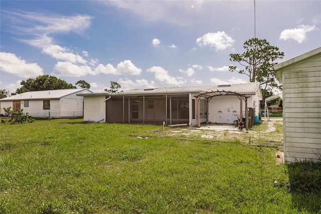 3497 Cohoes St, Port Charlotte, FL 33952 - rear view of house featuring a sunroom
