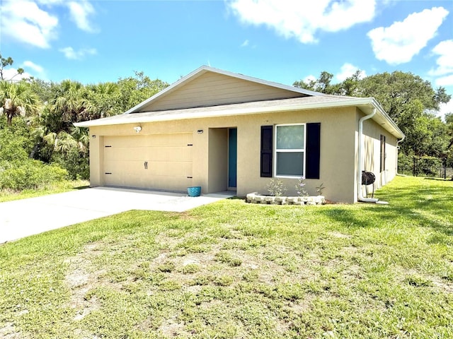 17344 York Ave, Port Charlotte, FL 33948 - view of front of property with an attached garage, stucco siding, and concrete driveway