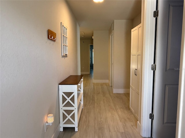 17344 York Ave, Port Charlotte, FL 33948 - corridor featuring baseboards and light wood finished floors