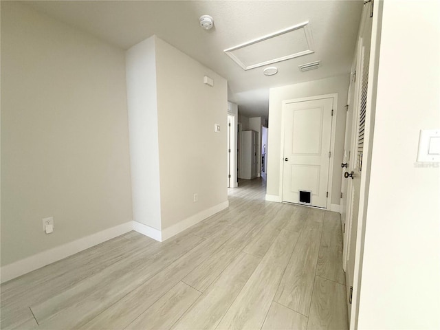 17344 York Ave, Port Charlotte, FL 33948 - hall featuring light wood-type flooring and attic access