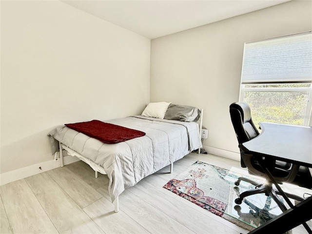 17344 York Ave, Port Charlotte, FL 33948 - bedroom featuring light wood-type flooring and a desk