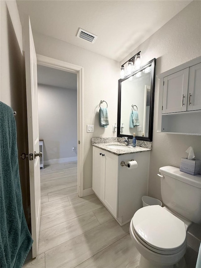 17344 York Ave, Port Charlotte, FL 33948 - bathroom featuring vanity and wood finished floors