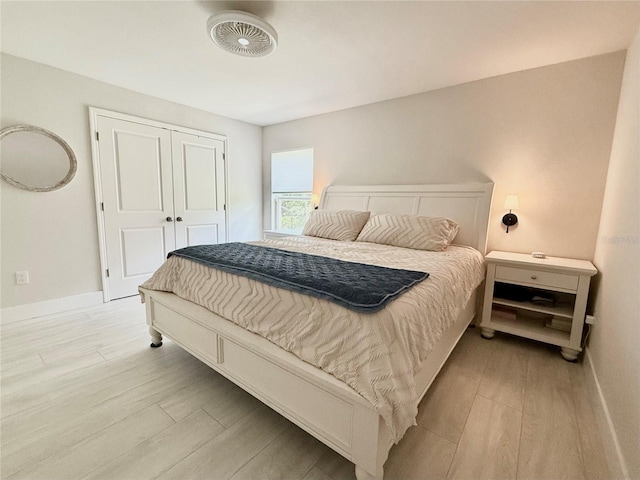 17344 York Ave, Port Charlotte, FL 33948 - bedroom with light wood finished floors and a closet