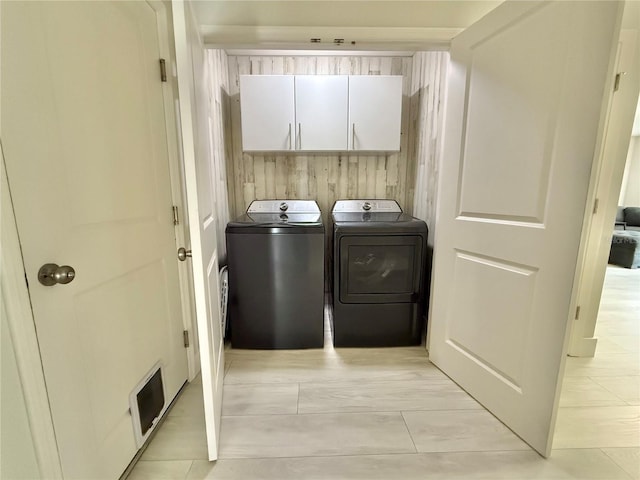 17344 York Ave, Port Charlotte, FL 33948 - laundry area with separate washer and dryer and cabinet space