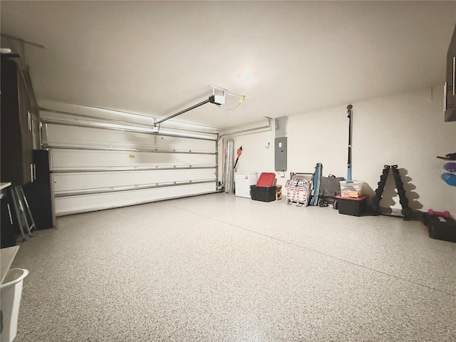 17344 York Ave, Port Charlotte, FL 33948 - garage featuring electric panel and a garage door opener