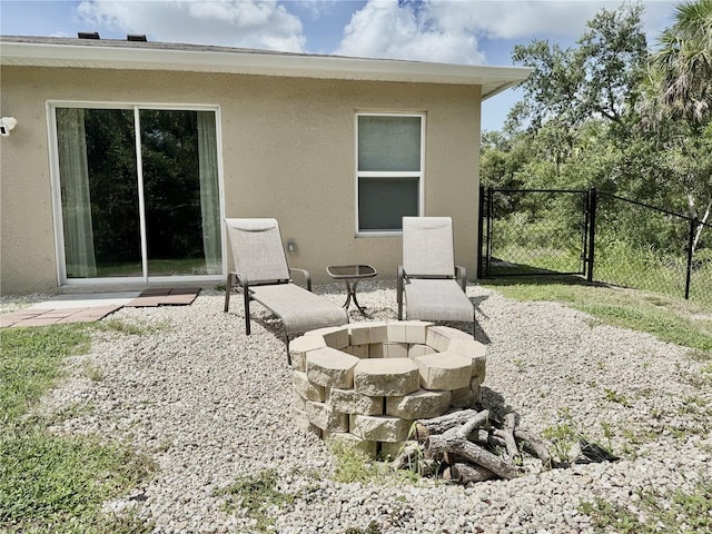 17344 York Ave, Port Charlotte, FL 33948 - view of patio with a fire pit