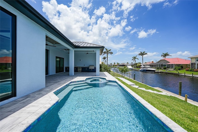 2815 Coral Way, Punta Gorda, FL 33950 - view of swimming pool with a ceiling fan, a water view, a patio area, a pool with connected hot tub, and a residential view