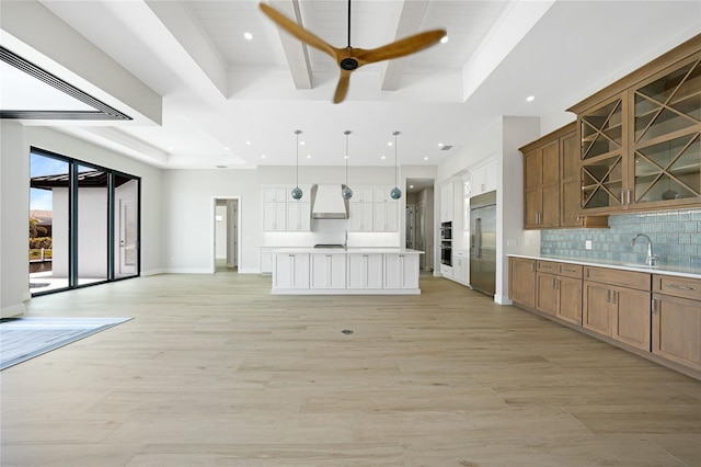 2815 Coral Way, Punta Gorda, FL 33950 - kitchen featuring wall chimney exhaust hood, stainless steel built in fridge, recessed lighting, light countertops, and a ceiling fan
